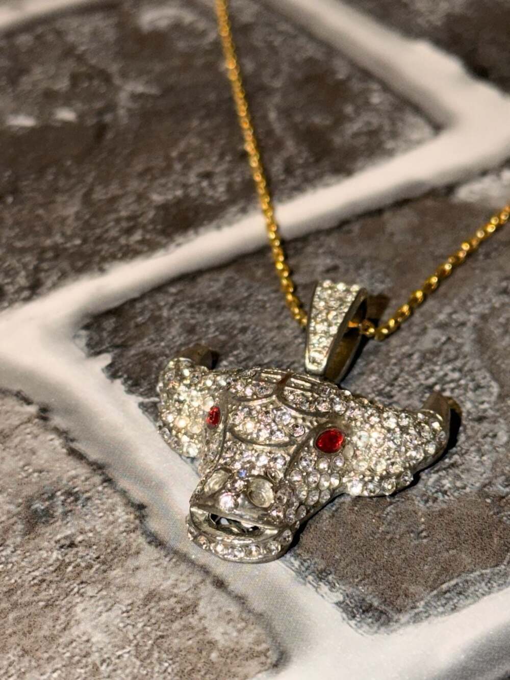 Unbranded Iced Out Bull Head Pendant Necklace with Red Stone Eyes